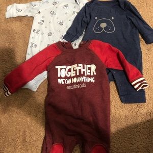 Bundle of 4 long sleeve one piece outfits.